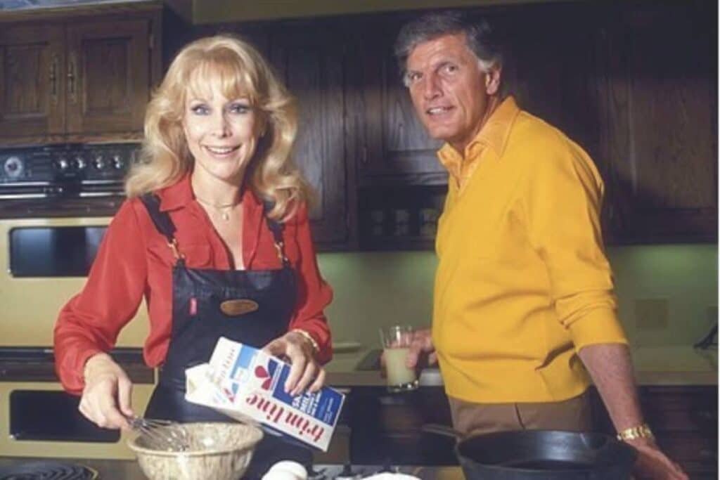 Barbara Eden and Charles Donald Fegert smiling together in a kitchen, captured during their married life in the late 1970s.